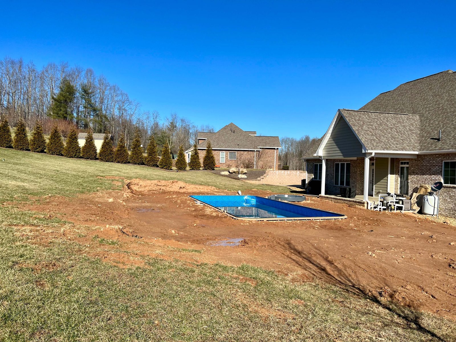 Retaining wall and patio installation in Morganton NC by Black Oak Hardscapes